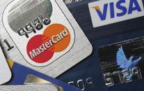 Болезненный удар по Visa и MasterCard, или что ждет американские платежные системы в России